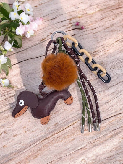 Taschenanhänger und Schlüsselanhänger mit Hund und Bommel PC11