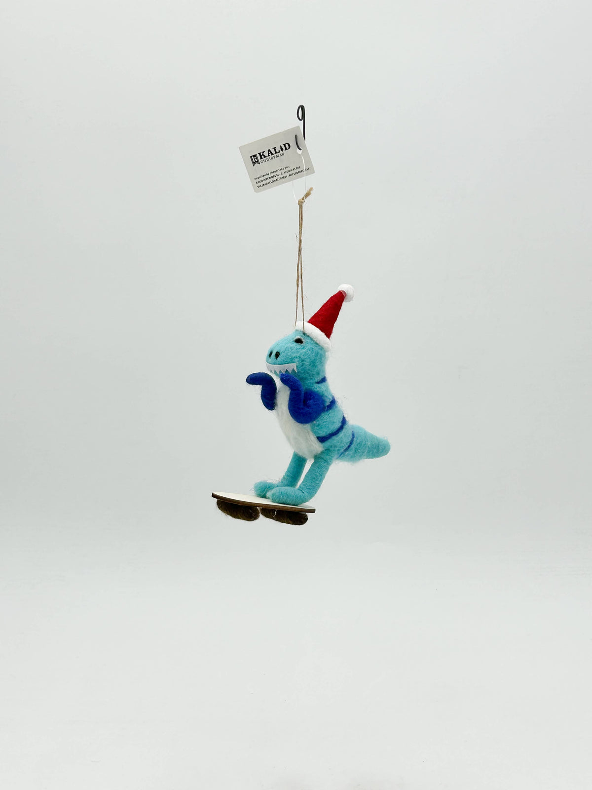 Filzfigur: Weihnachts-Dinosaurier auf Skateboard - FE449